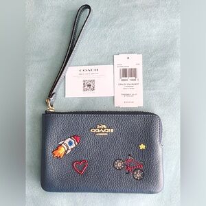 NWT Coach Corner Zip Wristlet with Rocket Bicycle Design in Gray SOLD OUT ONLINE